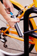 © M B S/Stocksy - female locking bike