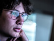 © Westend61 - Worried teenage boy with reflection on eyeglasses