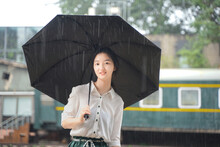 Girl Holding Umbrella In The Rain Abandoned Station Factory