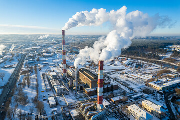 Aerial winter sunny frozen morning view of industrial factory in Vilnius, Lithuania