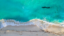 Aerial View Of Shore Of Sandy Coastal Beach And Turquoise Water Of Caribbean Sea