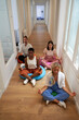© Westend61 - Business team practicing yoga while sitting on floor