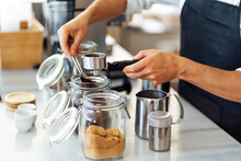 Chef Preparing Coffee In Commercial Kitchen
