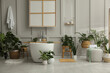 © New Africa - Stylish bathroom interior with green plants. Home design