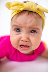 Wall Mural - little girl screams and cries. the kid is naughty
