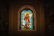 Stained Glass Window With Saint Michael Who Kills A Demon