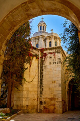 Wall Mural - Second Station of the Way of the Cross - Place of the Placement of the Cross. Franciscan monastery, dome of the Chapel of the Laying of the Cross. Jerusalem, Israel