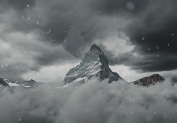 Leinwandbilder - view to the majestic Matterhorn mountain covered by grey clouds