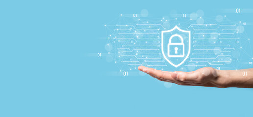 Protection network security computer and safe your data concept, Businessman holding shield protect icon. lock symbol, concept about security, cybersecurity and protection against dangers