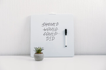 Wall Mural - Should Would Could Did handwriting text quote on white board on table at home or office. Inspirational, Motivational, Positive quote for Girl Boss