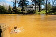 © Westend61 - Portugal, Azores, Sao Miguel, Turnas, hot spring at Parque Terra Nostra, woman in thermal pool