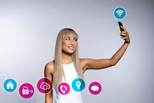 Happy Woman Taking Selfie Through Smart Phone With Icons On White Background