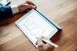 © Westend61 - Male professional drawing graph on digital tablet at office