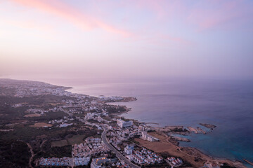 Wall Mural - Panoramic view from above to Protaras. Evening landscape in Cyprus. Hotels and tourist infrastructure in Cyprus. Cape Capo Greco