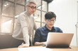 © chachamp - Senior businesswomen working with businessman in office