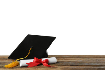 Wall Mural - Graduation hat and diploma on wooden table against  white background, space for text