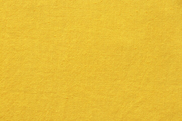 Wall Mural - Yellow cotton fabric texture background, seamless pattern of natural textile.