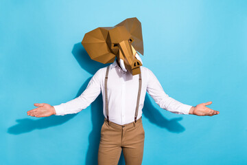 Sticker - Photo of strange funky man wear gold elephant mask leading party isolated blue color background