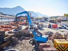 Austria, Tyrol, Brixlegg, Scrap Metal Being Recycled In Junkyard