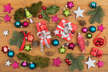 Collection Of Christmas Themed Items Flat Laid On Wooden Surface
