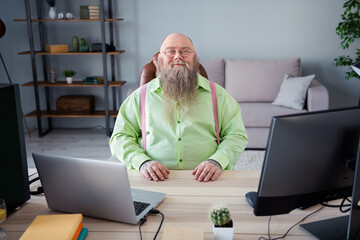 portrait of attractive cheery content skilled guy web company provider leader partner at office indo