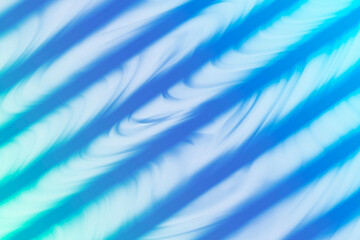 azure blue ocean rolling wave pattern and futuristic lines background