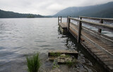 Fototapeta Góry - wooden pier on lake