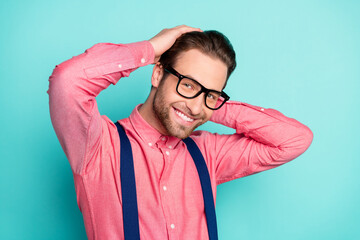 Sticker - Photo of groomed happy young gentleman hold hands hair smile barbershop isolated on teal color background