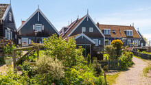 Traditional Wooden Houses In The Picturesque Fishing Village Of Marken On The Former Island On The Markermeer.