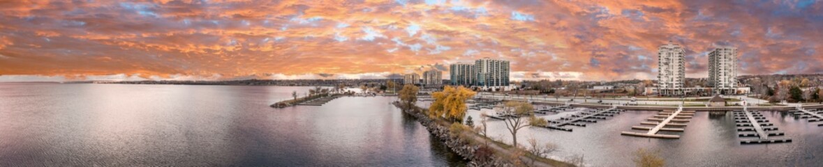 Barrie waterfront  sunset panorama centennial park with the boat yard and building in the back