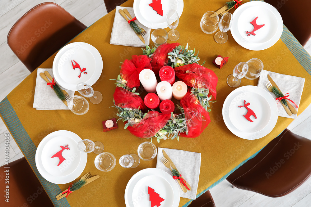 Dining table with setting for Christmas celebration indoors