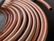 closeup copper pipe for installation of air conditioning systems.	
