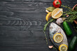 fish on wooden board ingredients lemon fresh food sea food