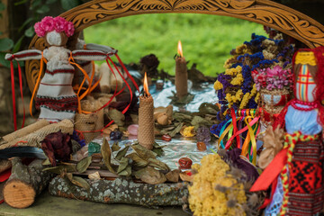 Altar of wicca, candle, magic books, tarot cards and other witch stuff. Mystic background with ritual esoteric objects, occult, fortune telling and Halloween concept