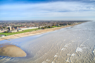 Poster - Aerial view over Littlehampton beach at low tide with a new sandbar in view near the River Arun and towards the resort seafront of Littlehampton.