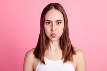Photo Of Youth Lovely Girl Pouted Cheeks Fooling Hold Breath Stupid Isolated Over Pink Color Background
