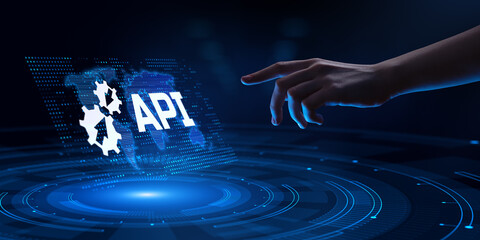 API Application Programming interface software web development concept. Hand pressing button on screen.