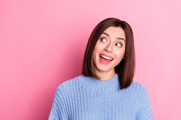 Poster - Portrait of attractive amazed curious cheery girly brown-haired girl looking aside copy space isolated over pink pastel color background