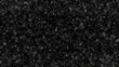 © PixlMakr - Snowflakes falling wildly on black background