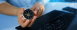 © Miha Creative - Business person who uses a navigation compass to resume business development in the economic crisis.Reinvention and recovery in business marketing.