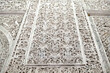 Patios, courtyards garden halls hallways colonnades frescoes tiles pillars in Moorish Arabian interior architecture design style with oppulent decor and textures inside Real Alcazar in Sevilla, Spain