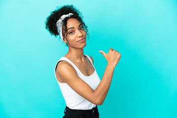 Sticker - Young latin woman isolated on blue background proud and self-satisfied