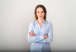 © Yakov - Close up beautiful young business woman with crossed arms