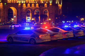 police car in night light city