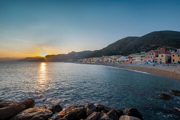 Wall Mural - The large beach of Varigotti at sunset.