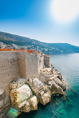 Wall Mural - Old city Dubrovnik, Croatia.View of historic city wall above the cliff and adriatic sea.