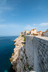Wall Mural - Old city Dubrovnik, Croatia.View of historic city wall above the cliff and adriatic sea.