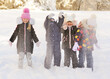 © Evgeniy Kalinovskiy - group of preschoolers in winter clothes have fun and throw snow.