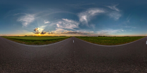 Wall Mural - full seamless spherical hdri panorama 360 degrees angle view on asphalt road among fields in summer evening sunset with awesome clouds in equirectangular projection, ready for VR AR virtual reality