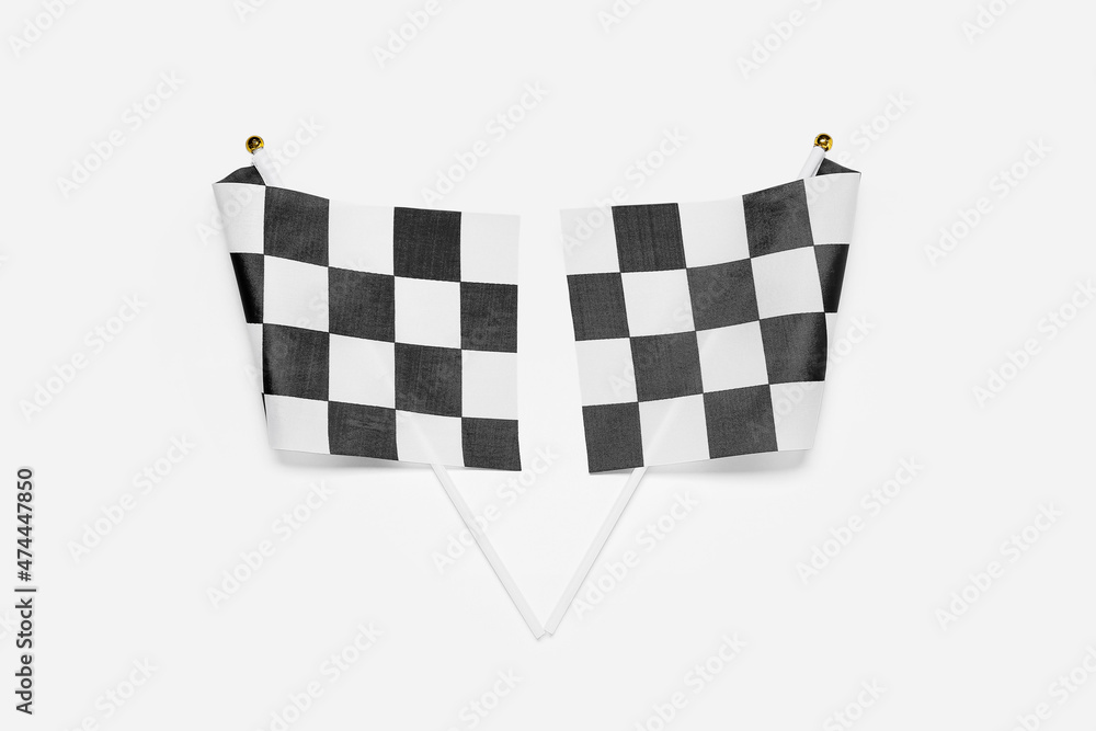 Racing flags on white background, top view